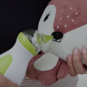 Demonstration of the use of the Nosiboo Go Portable Nasal Aspirator on a plush toy.