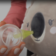 Demonstration of the use of the Nosiboo Eco Manual Nasal Aspirator on a plush toy.
